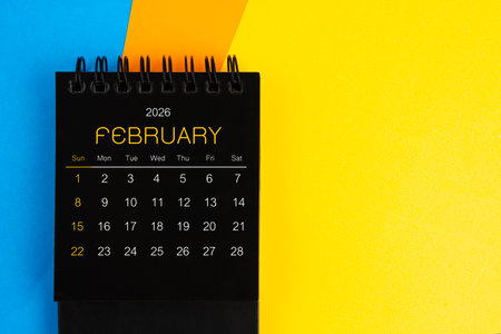 Black mini calendar for February 2026 on multi background.の写真素材