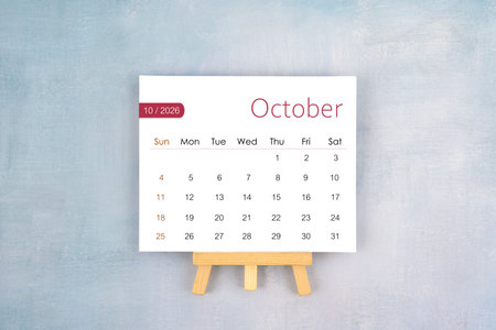 October 2026 calendar page with wooden easel.の写真素材