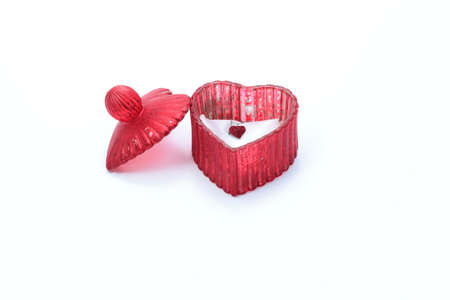 Heart shaped box with jewel, isolated on a white backgroundの写真素材