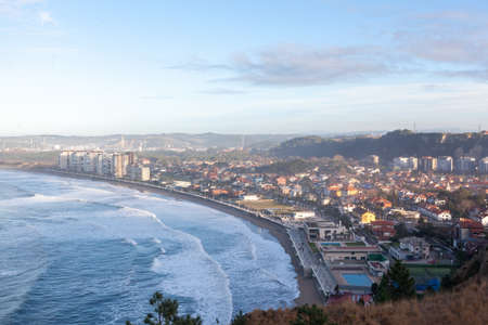 View of Salinas town and beach in Asturias, in northern Spain. Cantabric sea