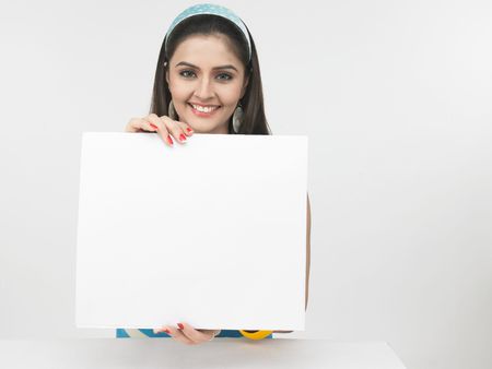 asian female with a blank placardの写真素材