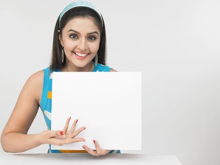 asian female with a blank placardの写真素材