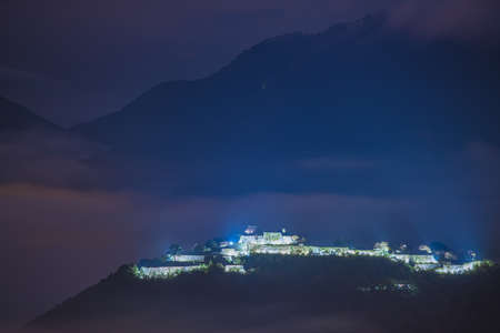 distant view of Takeda castle ruin from the Ritsuun-kyo valleyの写真素材