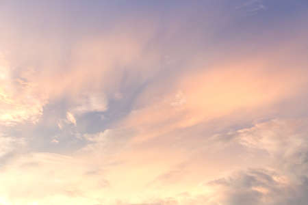 The vast sky and gold clouds,Light rain clouds and sunset during the rainy season the natural gold...