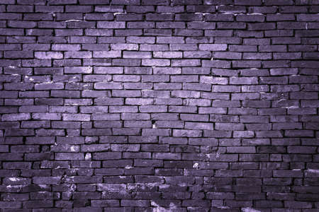 gloomy background, black brick wall of dark stone texture