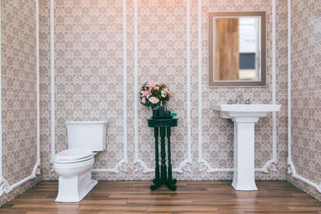 White toilet bowl in the bathroom with shower tiles and comfortable.の写真素材
