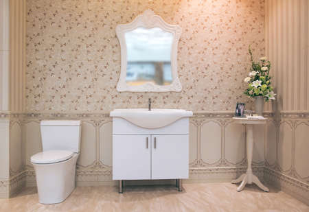 White toilet bowl in the bathroom with shower tiles and comfortable.の写真素材