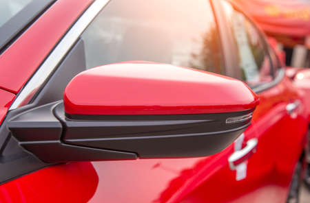 included in the side mirror turn signal of the red car. Concealed follower of a turn signal. The...