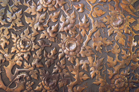 Copper lacquer Show flower art balance Global Crafts Thai artists. Place in Chiang Mai, Thailand. gold wall ,Thai traditional art in temple,Thailand. Decorative Art of Lanna Thai. Silver engravingの写真素材