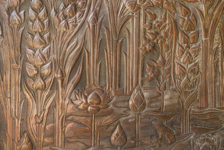 Copper lacquer Show flower art balance Global Crafts Thai artists. Place in Chiang Mai, Thailand. gold wall ,Thai traditional art in temple,Thailand. Decorative Art of Lanna Thai. Silver engravingのeditorial素材