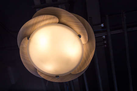 led light bulb in the industrial lamp is bright on the ceiling of the new warehouse with copy space, High Bay Lightingの写真素材