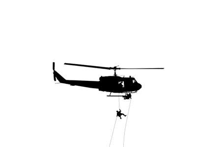 Silhouette Soldiers rappel down to attack from helicopter with warrior beware danger On isolated on White Background and copy space add text ( Concept stop hostilities To peace)の写真素材
