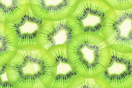 Ripe whole kiwi fruit and half kiwi fruit isolated on white background.の写真素材