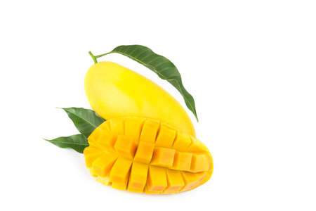 Mango fruit with mango cubes and slices. Isolated on a white background.の写真素材