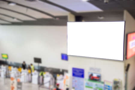 mock up of horizontal blank advertising billboard or light box showcase in waiting zone at airport, space for your text message or media content, advertisement, commercial and marketing conceptの写真素材