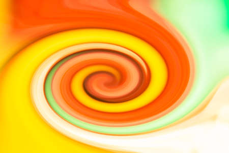 modern creative wonderful eddy futuristic festival happy aqua backdrop of vivid multi colored glossy curled striped spraying ripple sphere. Closeup view with space for text in middle of funnelの写真素材