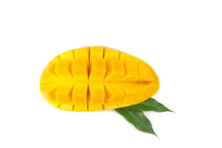 Mango fruit with mango cubes and slices. Isolated on a white background.の写真素材
