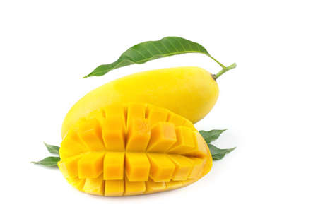 Mango fruit with mango cubes and slices. Isolated on a white background.の写真素材