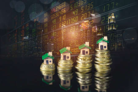 Stock market or forex trading graph and candlestick chart suitable for Real estate investment. Economy trends background for business idea and all art work design. Abstract finance background.の写真素材