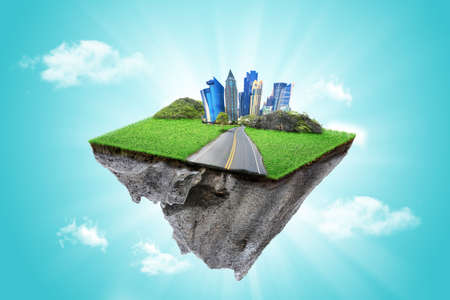 round soil ground cross section with earth land and  modern city  . fantasy floating island with natural on the rock, surreal float landscape with paradise conceptの写真素材