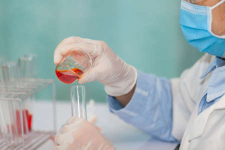 Health care researchers working in life science laboratory and analyzing microscope slides in research lab. New Epidemic Corona Virus. Corona virus outbreaking. Corona Virus in Lab.の写真素材