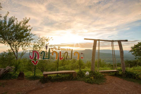 Loei / Thailand - PHU PA PO wooden sign with viewpoint mountain, Loei, Thailand.の写真素材