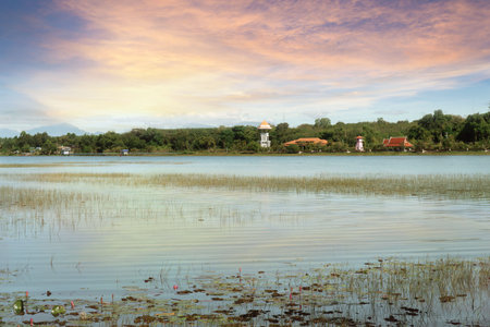 There is a beautiful cloud reflecting on the water. The water,the swamp,fog,the mountain,the beautiful sky and cloud at Bueng Khong Long,Seka district,Bung Kan province,Thailand.の写真素材