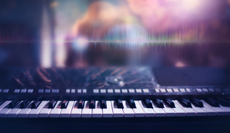 A piano keyboard background is set up in the music room by the window in the morning for pianists to practice before a classical piano performance in celebration of a great achievement.の写真素材