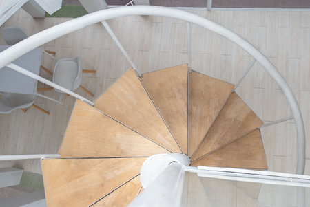 Spiral steel staircase circular staircase decoration interior. travel and architecture background.spiral staircase dark colorの写真素材