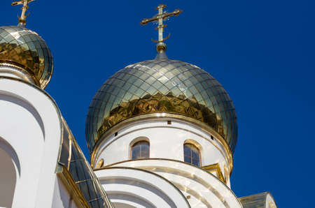 Church gold domes against the dark blue skyの写真素材