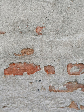 Texture of old rustic wall covered with gray stucco. Abstract background for design.