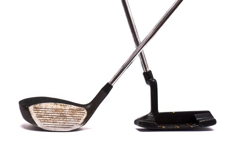 Vintage golf clubs on white の写真素材