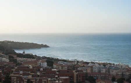 Cefalu Coast with houses and blue seaの写真素材