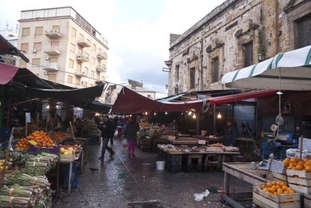 PALERMO - DECEMBER 22: Street of local market in Palermo, called Ballaro. This market is also tourist attraction in Palermo, Sicily, Italy on Dec. 22, 2012のeditorial素材