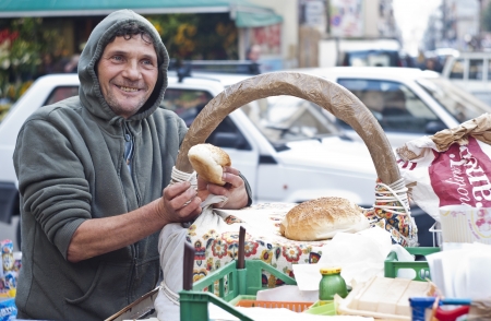 PALERMO - DECEMBER 29: Man sells Frittola on the local market in Palermo, called Ballaro. This market is also tourist attraction in Palermo, Sicily, Italy on Dec. 29, 2012.のeditorial素材
