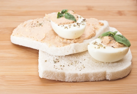 sandwich with egg and tuna sauce on wooden boardの写真素材