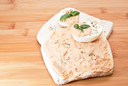 sandwich with egg and tuna sauce on wooden boardの写真素材