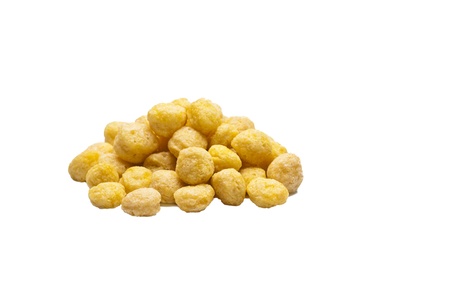 a pile of honey ball cornflakes on withe backgroundの写真素材