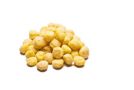 a pile of honey ball cornflakes on withe backgroundの写真素材