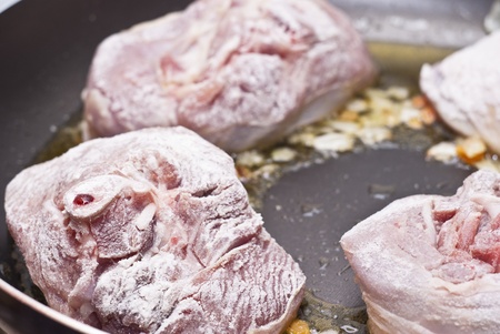 Paesant food. floured osso buco in panの写真素材
