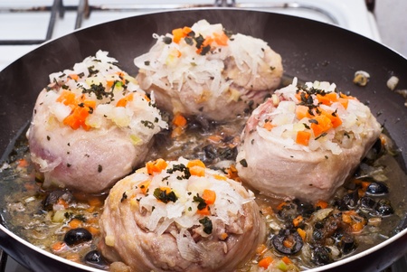veal shank cooking in frying panの写真素材