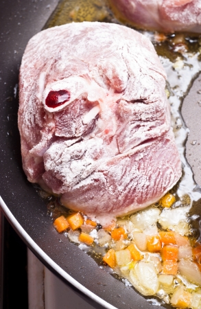 Paesant food. floured osso buco in panの写真素材