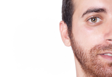 Charming and handsome man half face close upの写真素材