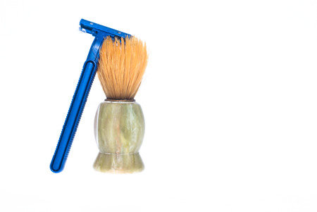 shaving brush and razor on a white backgroundの写真素材