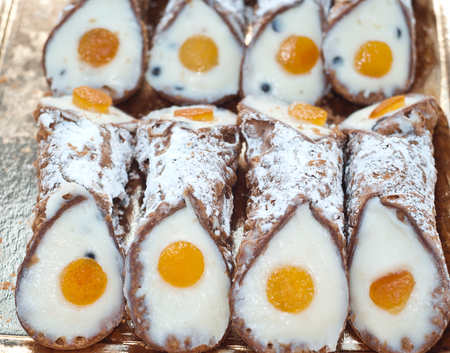 Sicilian cannoli with orange typical sicilian sweet  closeupの写真素材