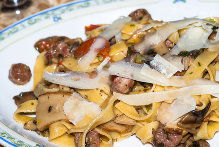 tagliatelle with mushrooms served at the Italian restaurantの写真素材