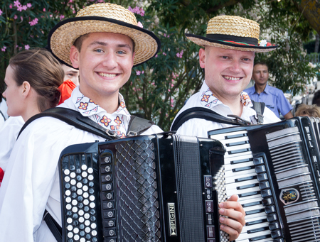 POLIZZI GENEROSA, SICILY-AUGUST 09 2015: Bosnia ed Erzegovina folk group at the "Festival of hazelnuts" music and parade through the city in Polizzi Generosa, Sicily, Italyのeditorial素材