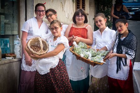 POLIZZI GENEROSA, SICILY-AUGUST 09 2015 :childrens undefined from sicilian folk group at the International Festival of hazelnuts in Polizzi Generosa,Sicily, Italyのeditorial素材