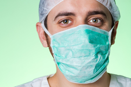 Young confident and friendly doctor isolatedの写真素材