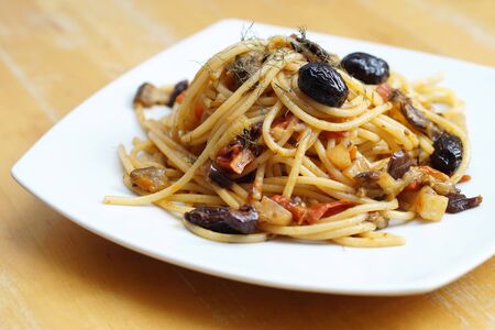 spaghetti with celeriac and olives. closeup                 の写真素材